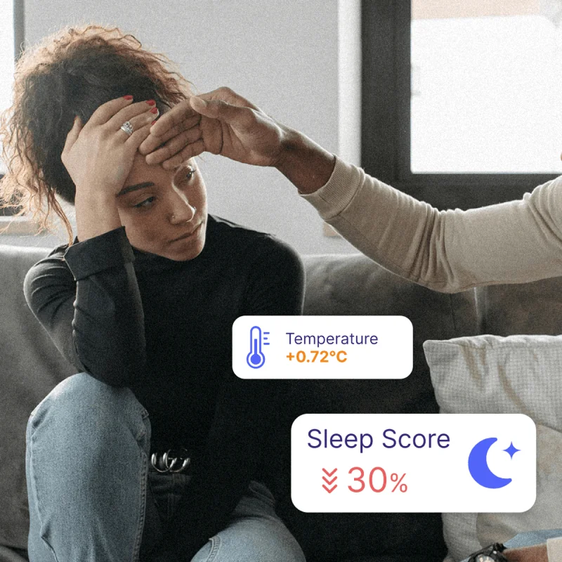 Disease Prevention with blēo Woman checking temperature with blēo health data overlay, showcasing disease prevention through lifestyle tracking.